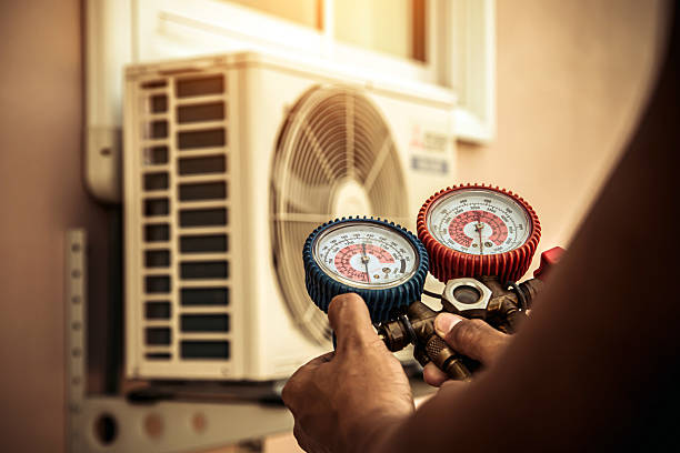 Professional Hvac technician working in Michigan Center, MI